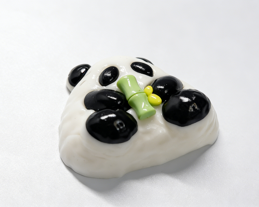 Panda hugging bamboo squishy